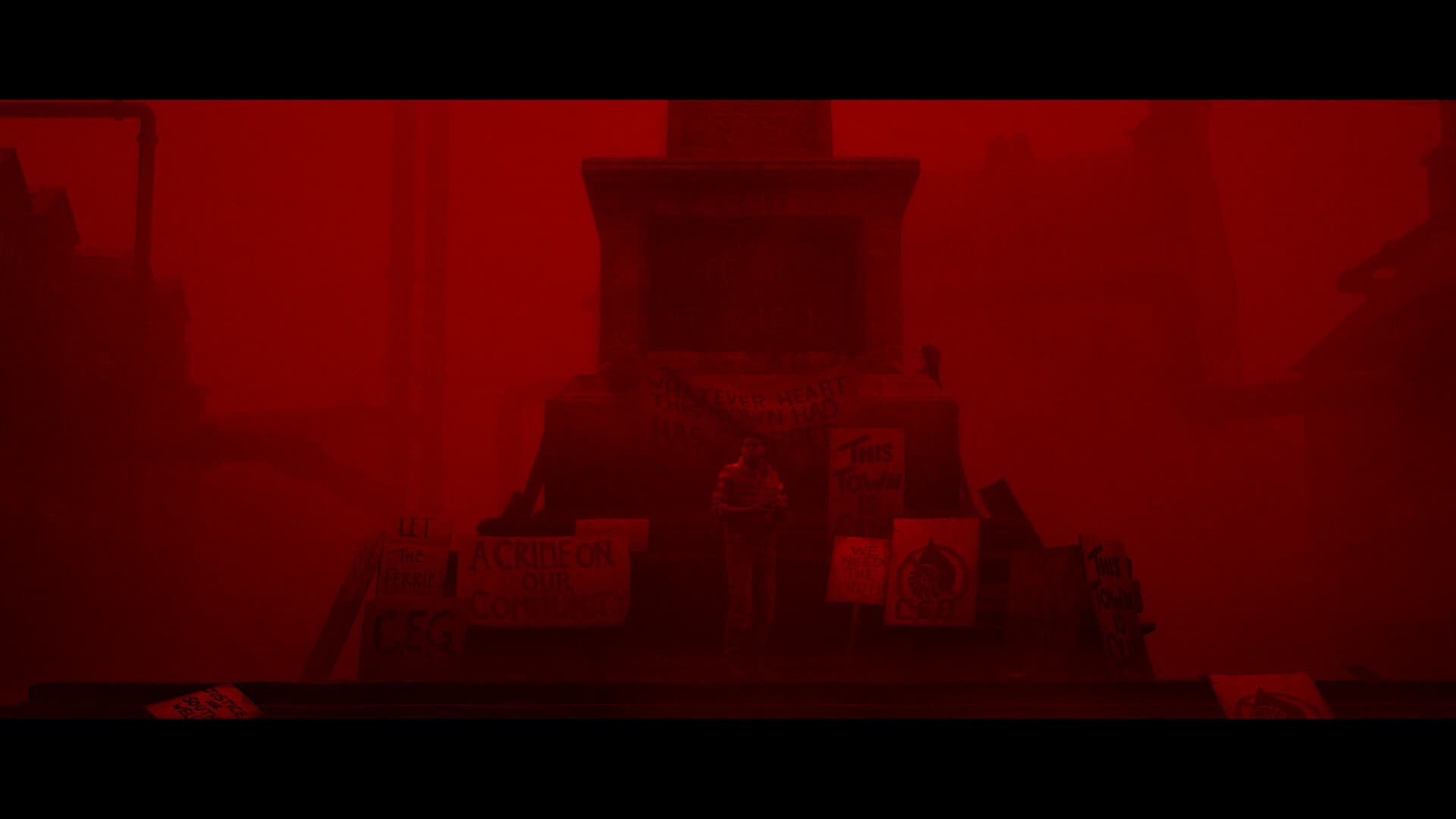 The town square turns red in the otherworld, CEG protest signs scattered around the monument